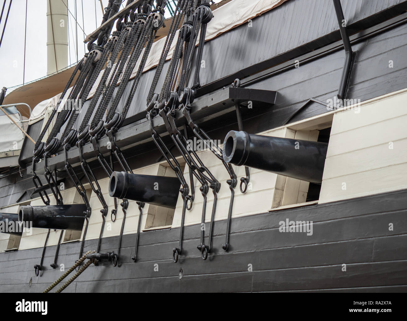 Four cannons out of gun port for along with shipping materials naval artillery on sailing