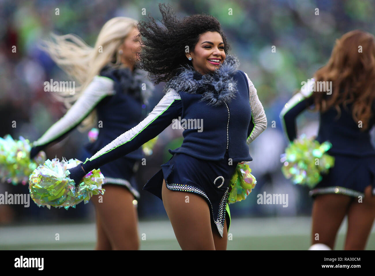 Seattle, WA, USA. 30th Dec, 2018. The SeaGals perform before a game between the Arizona Cardinals and the Seattle Seahawks at CenturyLink Field in Seattle, WA. Sean Brown/CSM/Alamy Live News Stock Photo