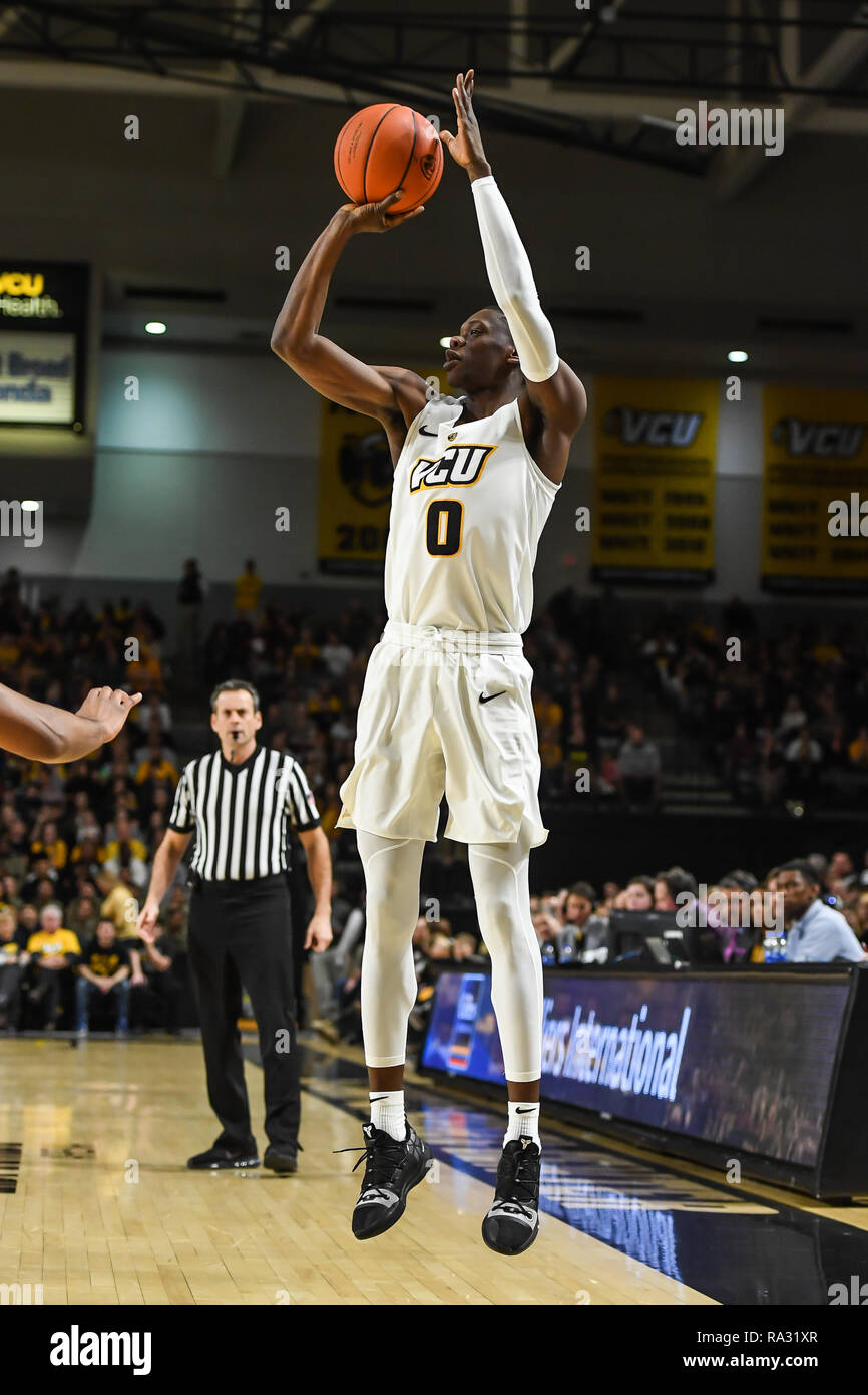 Richmond, Virginia, USA. 30th Dec, 2018. DE'RIANTE JENKINS (0) shoots a