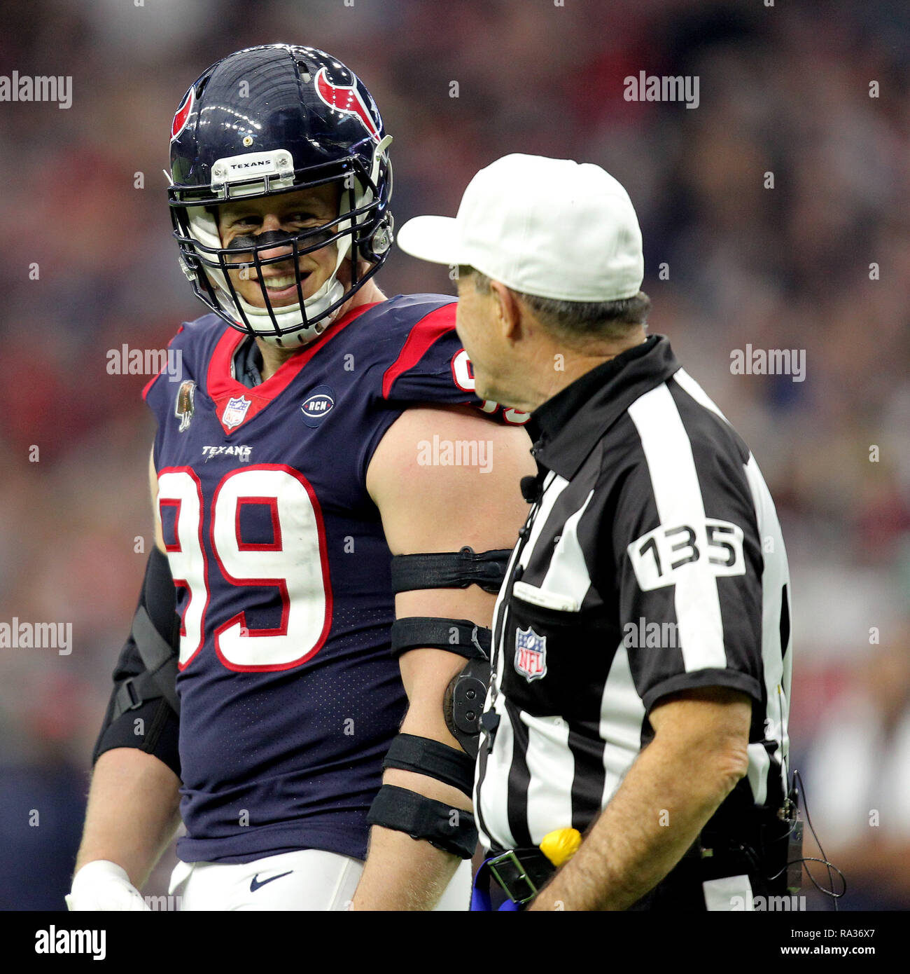 Referee Tony Corrente (99) uses a Microsoft Surface to watch a replay  during the second half of an NFL preseason football game between the  Carolina Panthers and the Houston Texans, Wednesday, Aug.