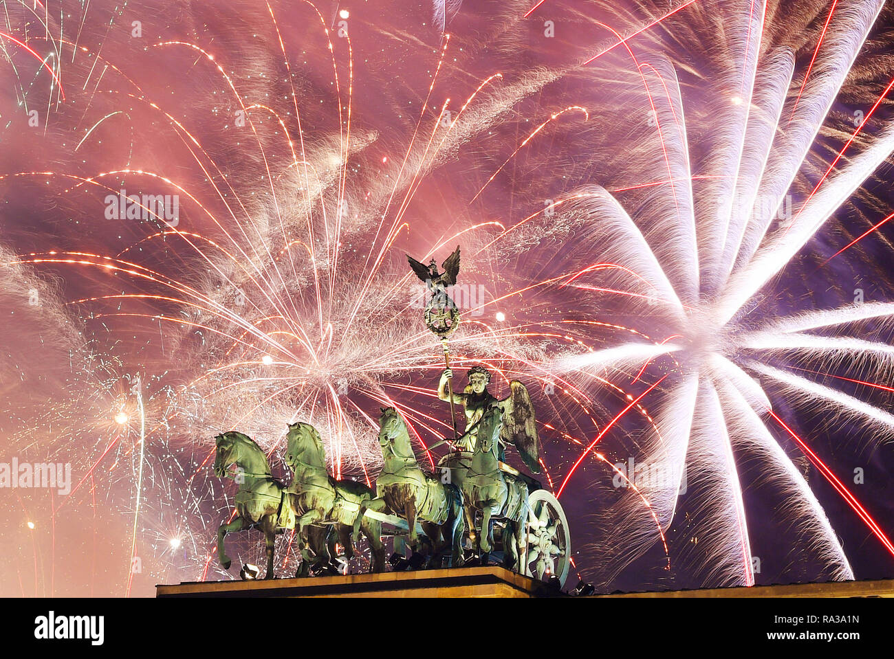 31 December 2018, Berlin Fireworks can be seen at the Brandenburg Gate
