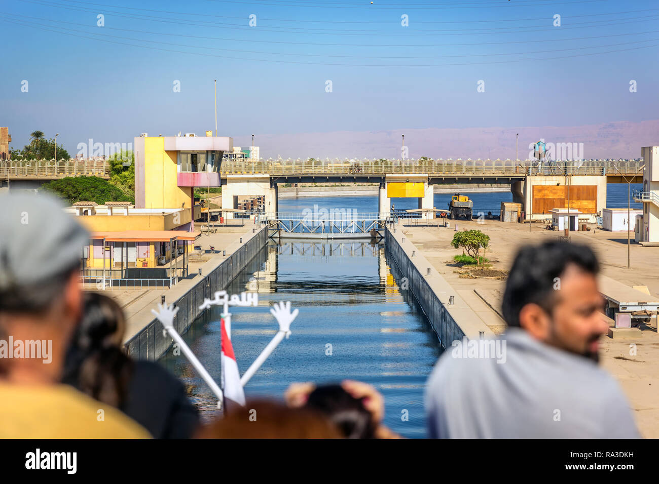 Nile river, Egypt - Nov 7th 2018 - Tourists having fun while the cruiser prepare to enter a lock in the Nile River in Egypt. Stock Photo