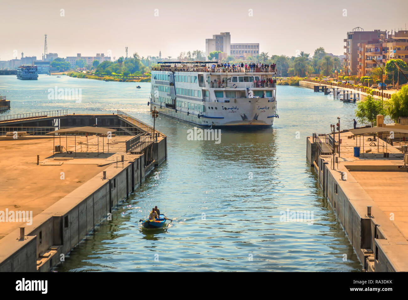 Nile river, Egypt - Nov 7th 2018 - A big touristic cruiser heading to a lock in the Nile River in Egypt Stock Photo