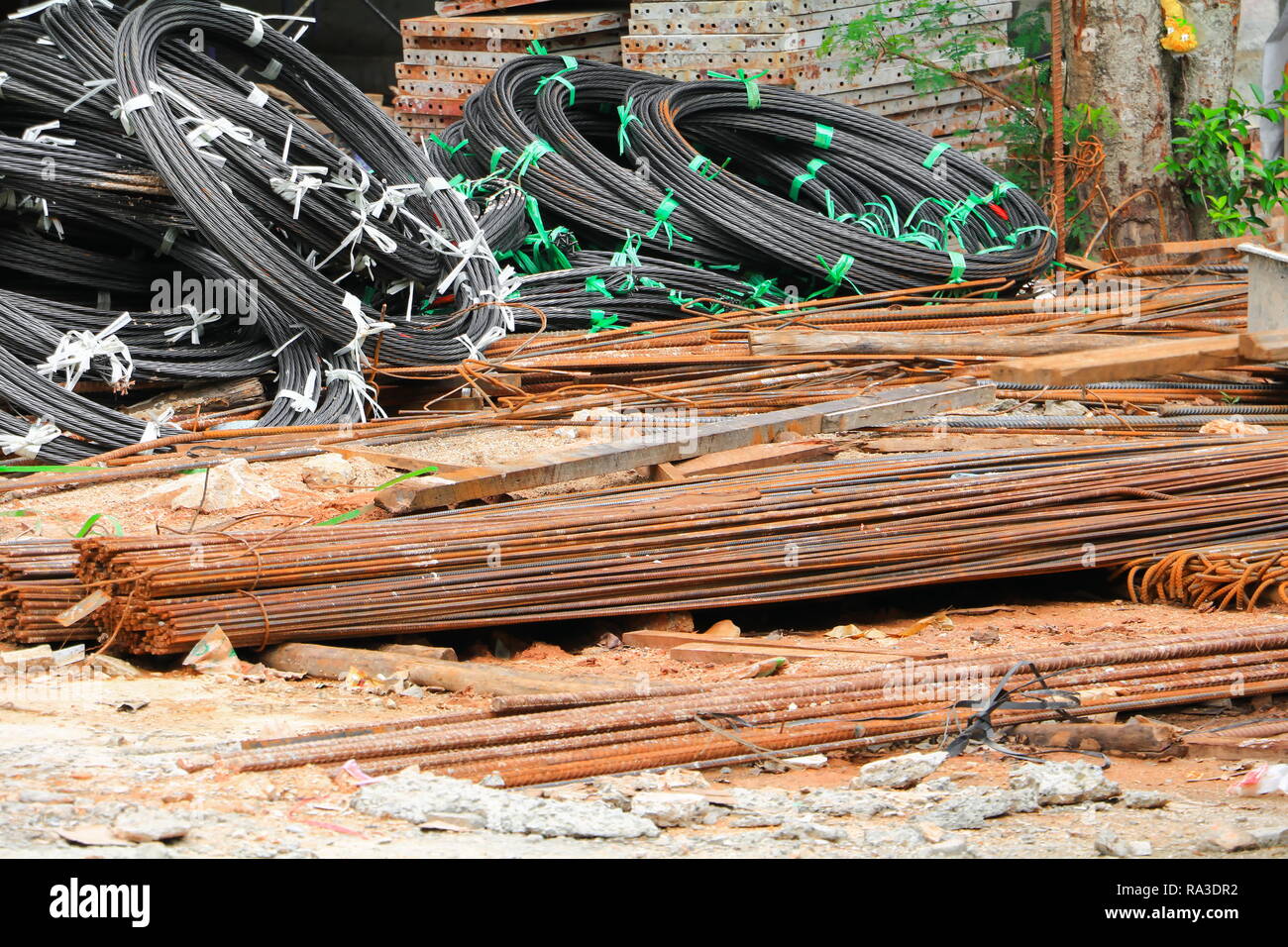 steel bar, iron in a construction site is rust on the ground select ...