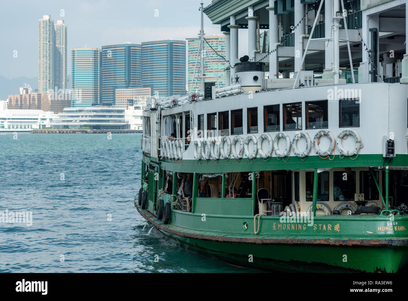 The 'Morning Star', ferry tied up at the Central Ferry pier loading passengers for its short crossing of Victoria Harbour to Tsim Sha Tsui Stock Photo