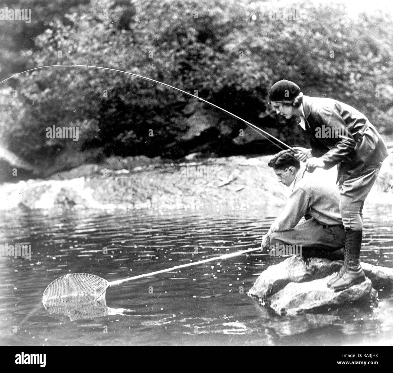 Early 1900s man fishing hi-res stock photography and images - Alamy