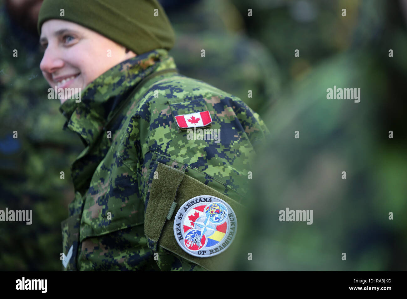 Bucharest, Romania - December 1, 2018: Details with the uniform and flag of Canadian soldiers taking part at the Romanian National Day military parade Stock Photo