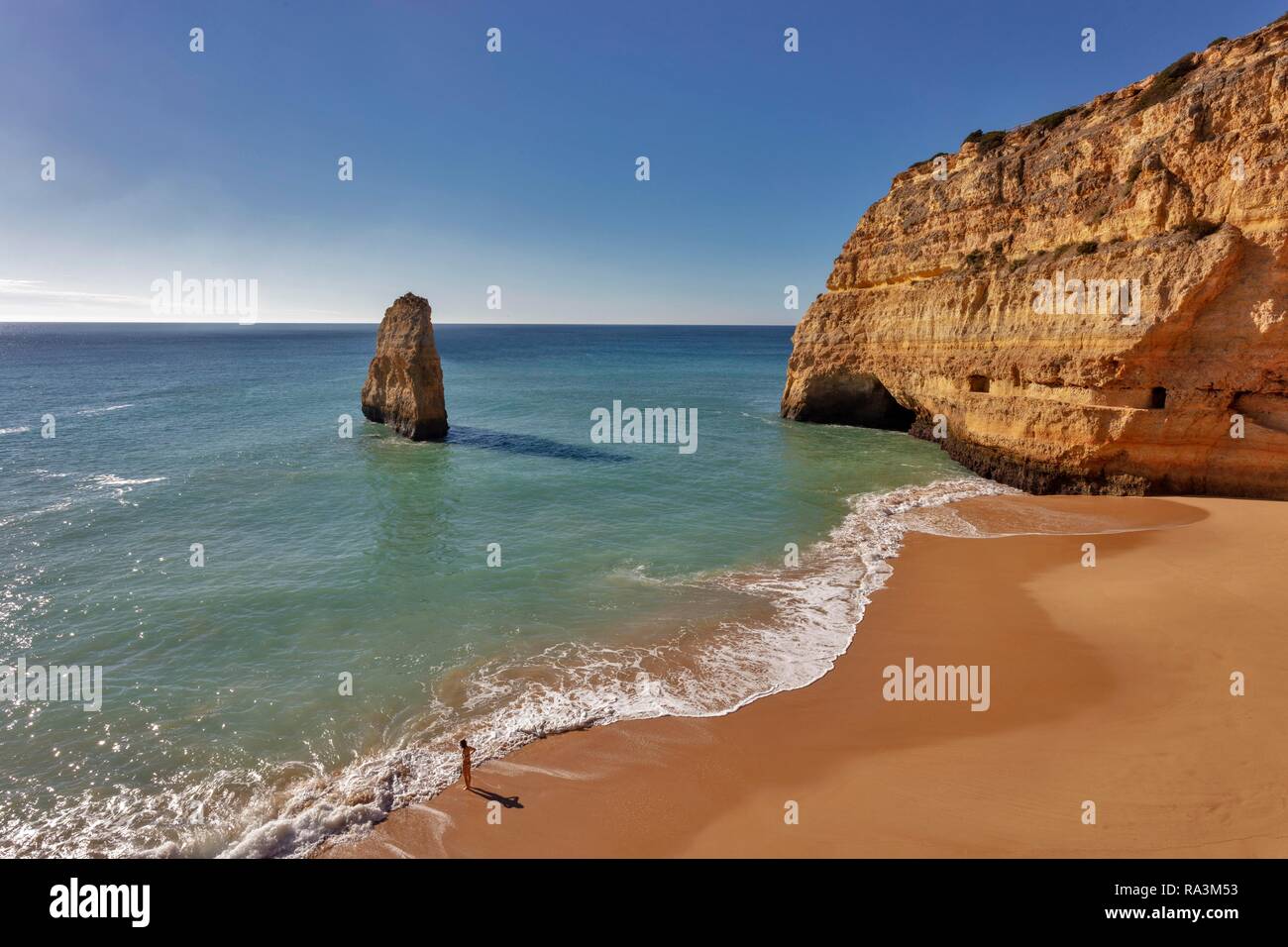 Rock at the sandy beach Praia do Carvalho, Carvoeiro, Algarve, Portugal Stock Photo