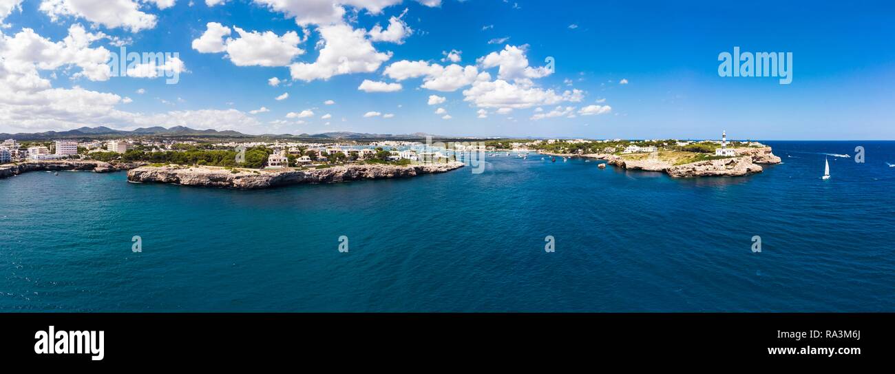 Aerial view, Bay of Portocolom and Cala Parbacana, lighthouse, Punta de ses Crestes, Potocolom, Majorca, Balearic Islands, Spain Stock Photo