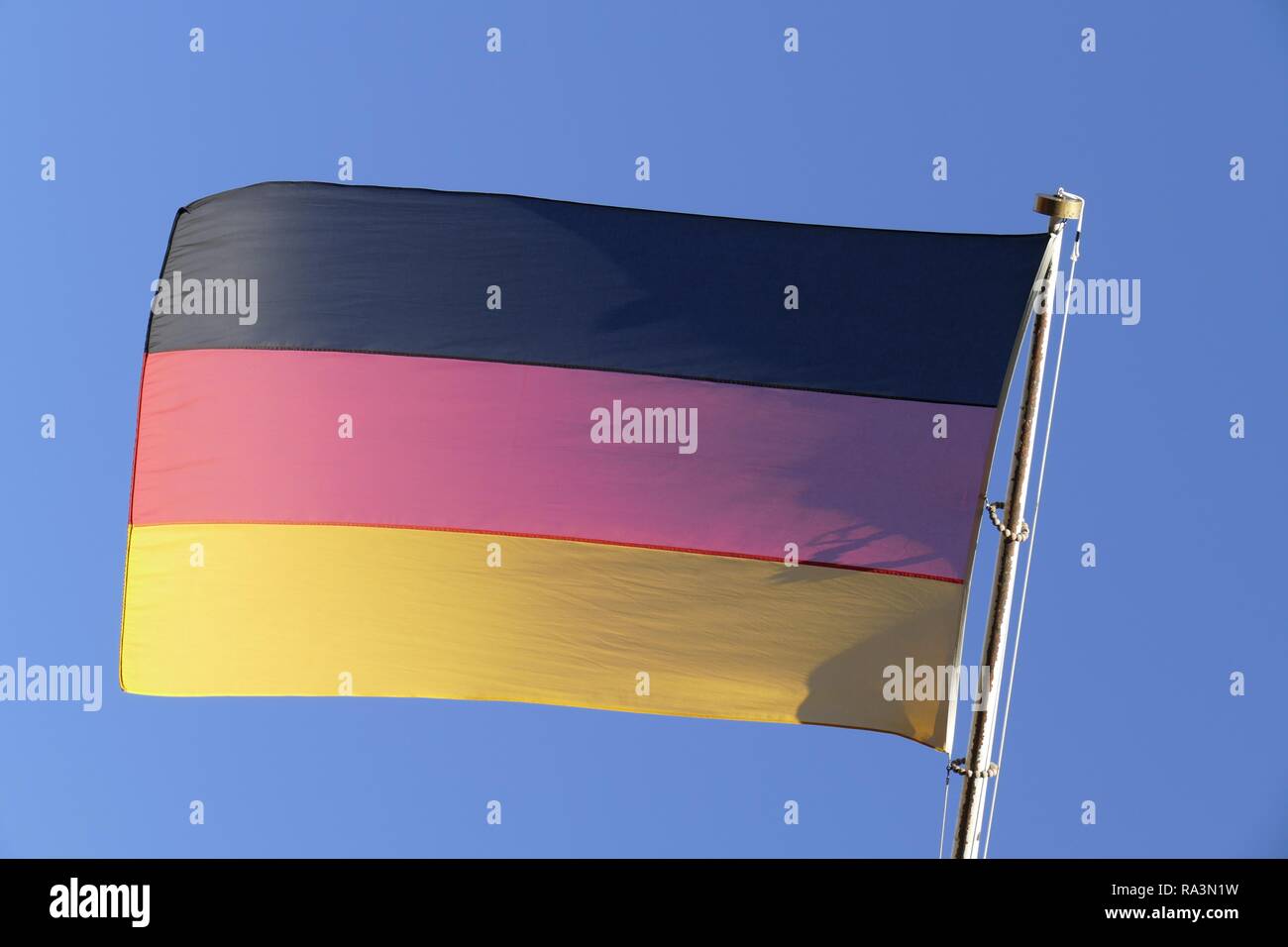 German flag in front of blue sky, Bremen, Germany Stock Photo