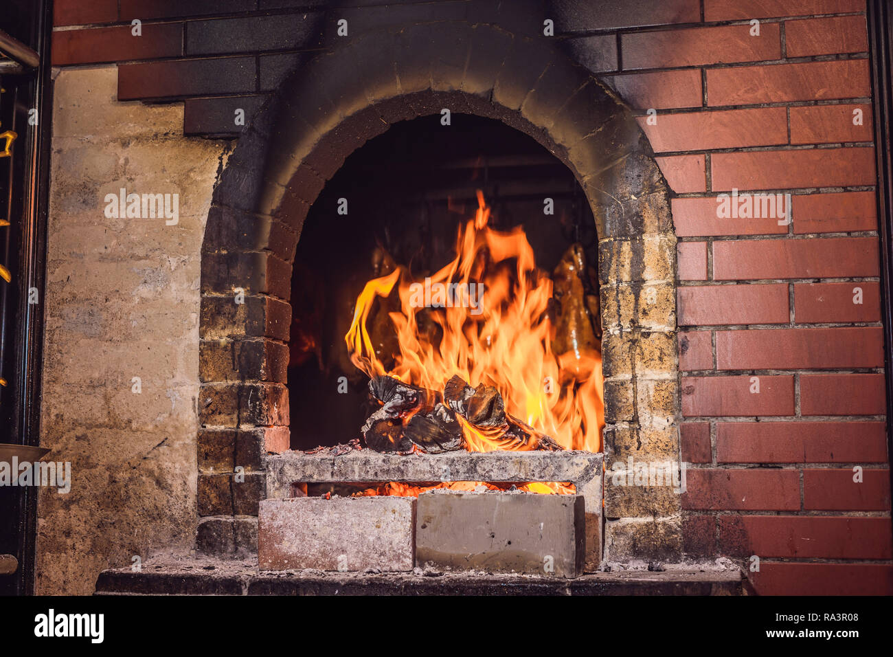Peking duck is roasting in the oven, preparing to serve on the cost