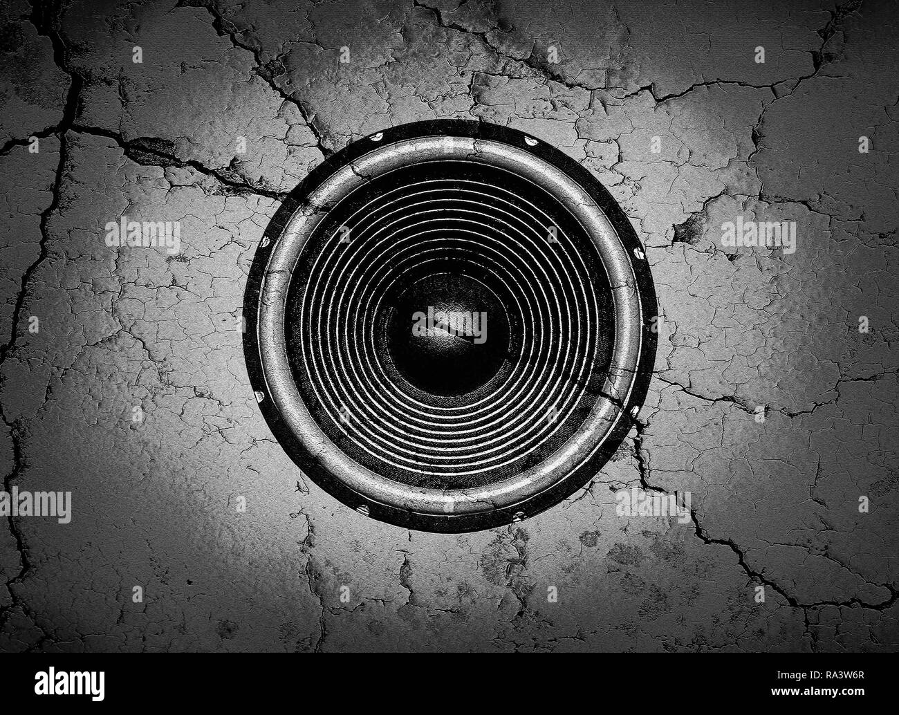Black and white music speaker on a cracked wall background Stock Photo