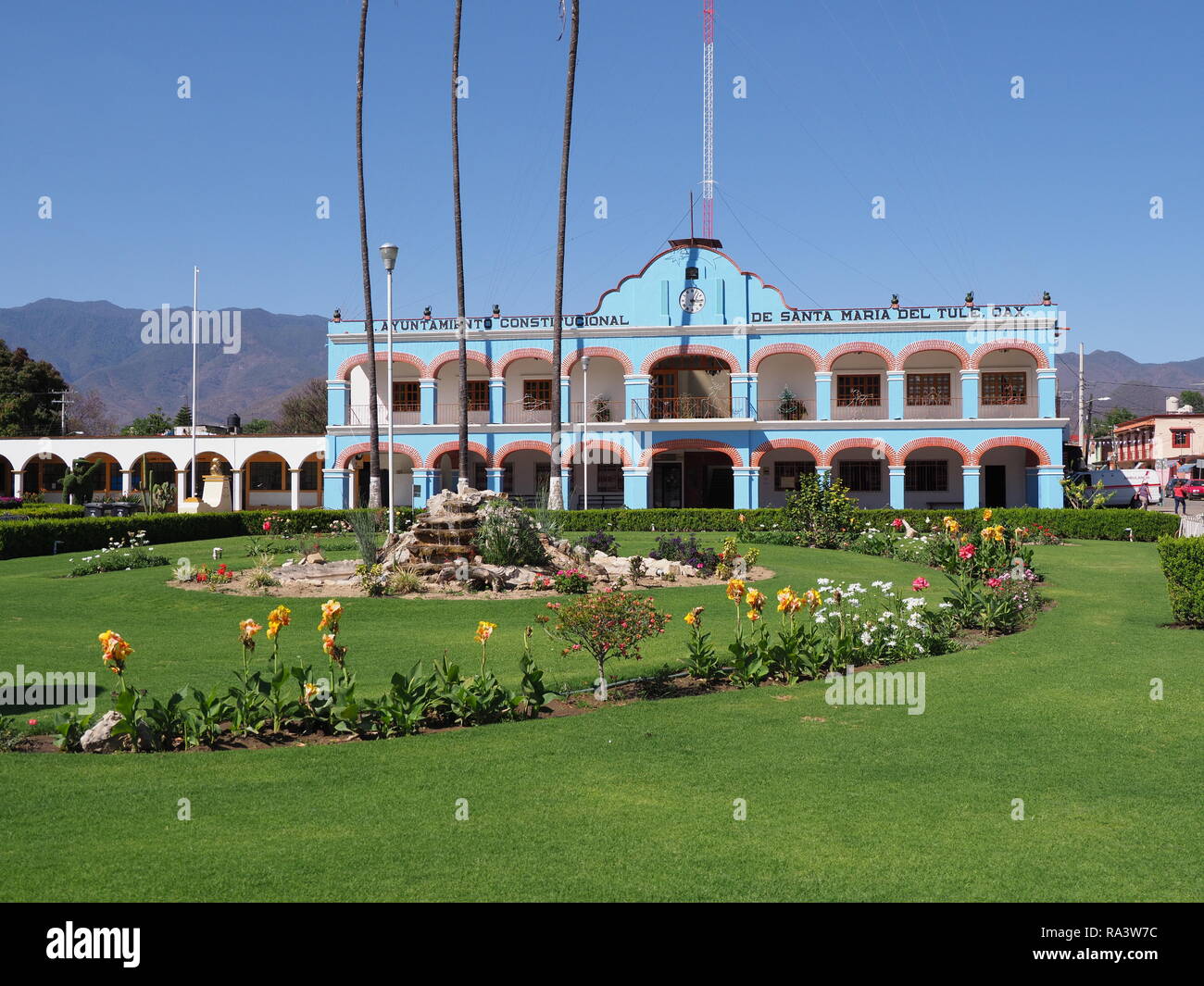 SANTA MARIA del TULE, NORTH AMERICA MEXICO on FEBRUARY 2018: Green plants on main square in front of town hall in mexican city center at Oaxaca state  Stock Photo