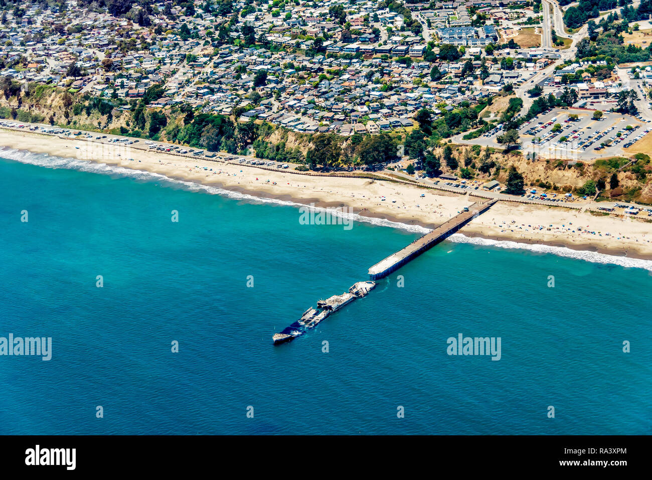 Aerial view of a sunken ship at the end of the pier in Aptos, California. Stock Photo