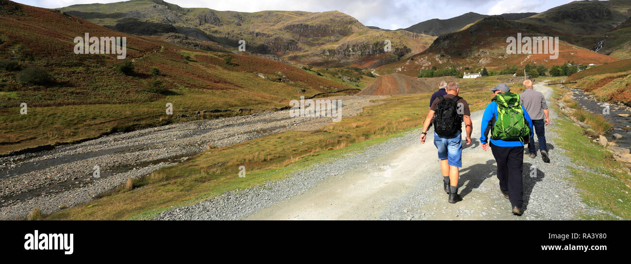 Walkers in the Copper Mines Valley above Coniston town, Lake District National Park, Cumbria, England, UK Stock Photo