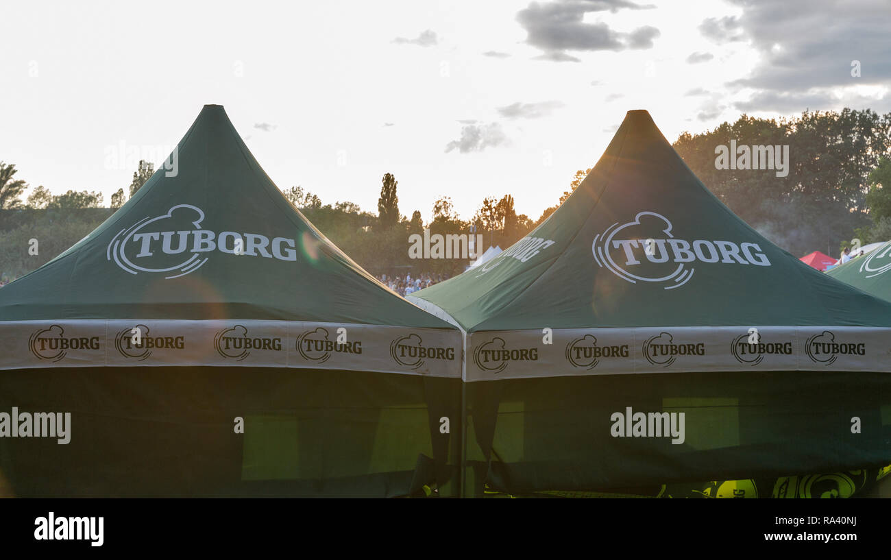 KIEV, UKRAINE - JULY 08, 2018: Tuborg beer outdoor bar at the Atlas Weekend Festival in National Expocenter. Tuborg is a Danish brewing company, part  Stock Photo