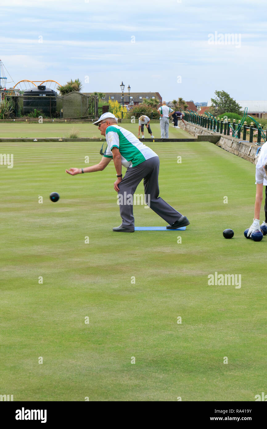 Outdoor Bowls tournament being played on a summers day, at the Hunstanton Cliff Parade WBA bowls club. Hunstanton, Norfolk, England UK Stock Photo