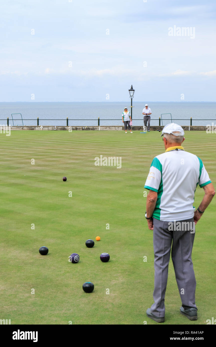 Outdoor Bowls tournament being played on a summers day, at the Hunstanton Cliff Parade WBA bowls club. Hunstanton, Norfolk, England UK Stock Photo