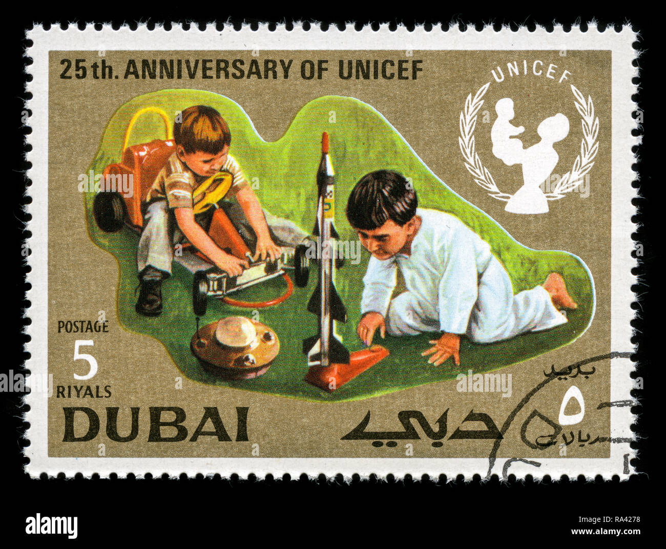 Postage stamp from the Dubai in the United Arab Emirates in the UNICEF, 25th Anniversary series issued in 1971 Stock Photo