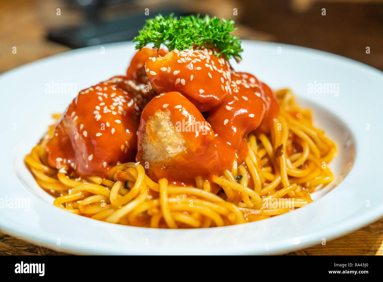 Spaghetti fried chicken cubes Stock Photo Alamy