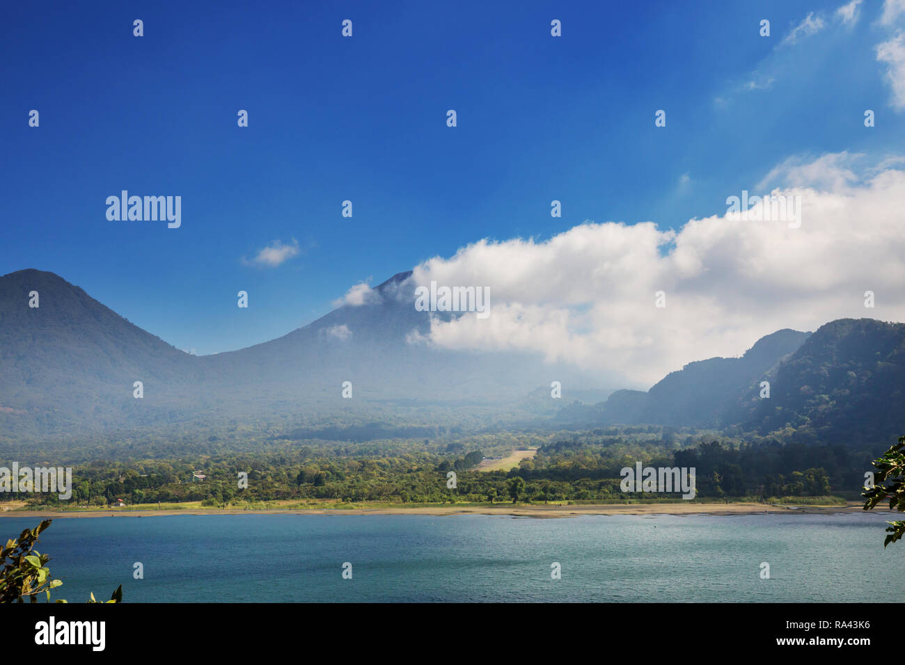 Beautiful lake Atitlan and volcanos in the highlands of Guatemala, Central America Stock Photo
