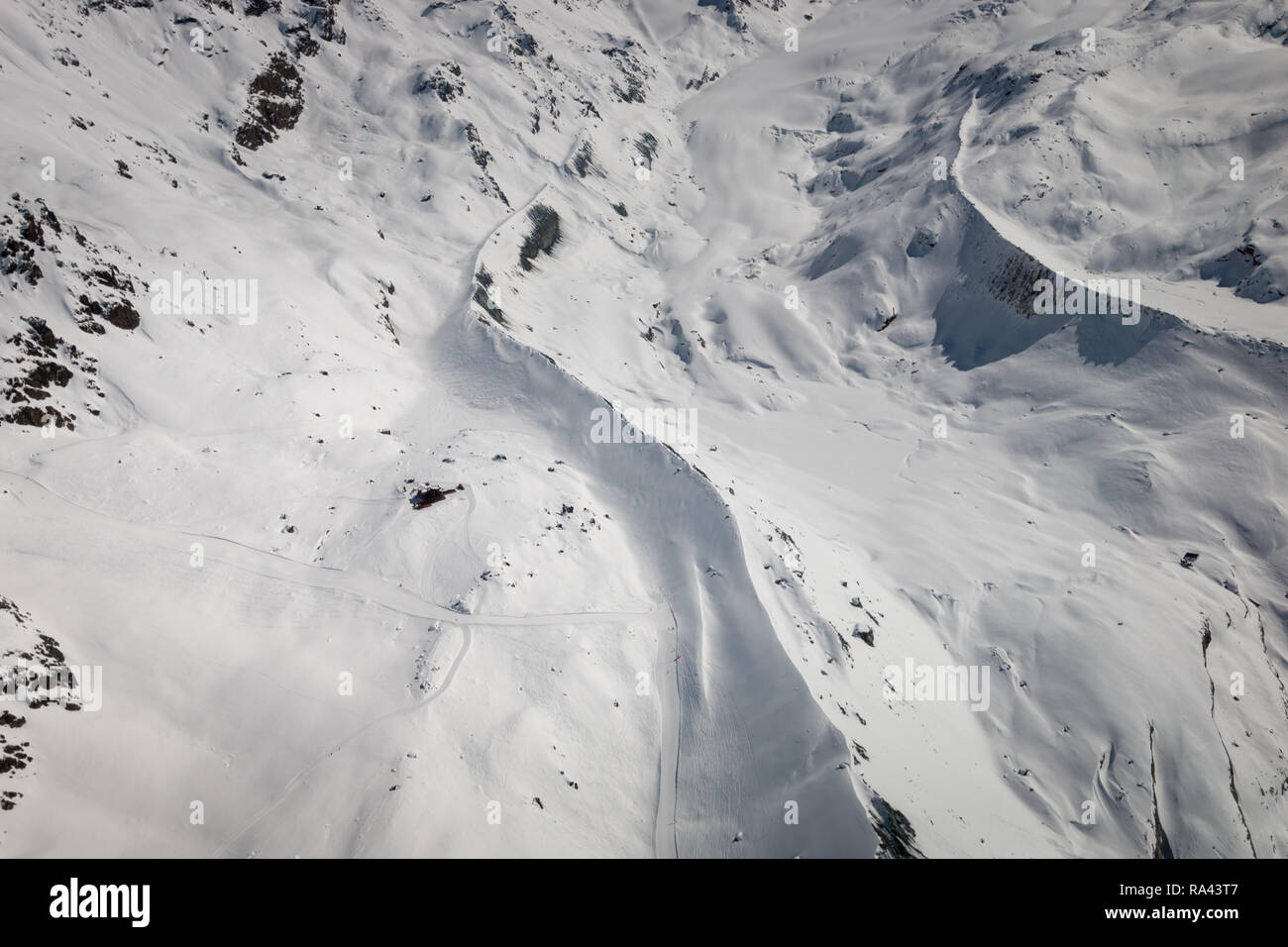 Aerial view of snow covered landscape in the Swiss ski region of Zermatt with Fluhalp Stock Photo