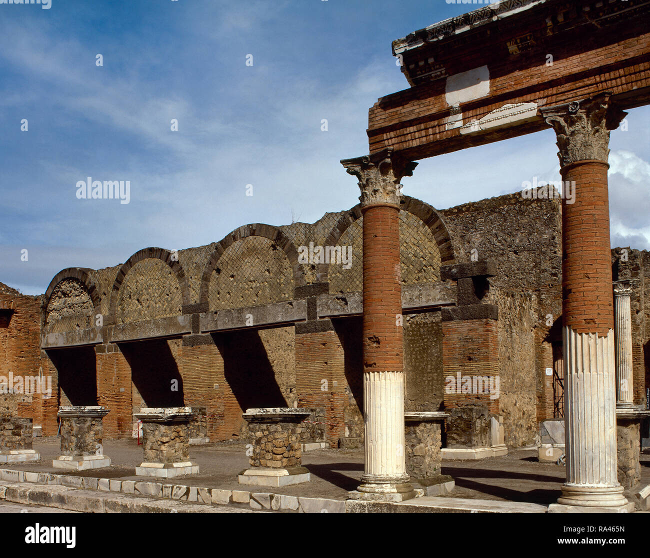 Italy. Pompeii. The Macellum , the public food market, in the north-east corner of the Forum. This complex was built in the imperial age. There was a large number of shops. View of one of the three entrances. Campania. Stock Photo