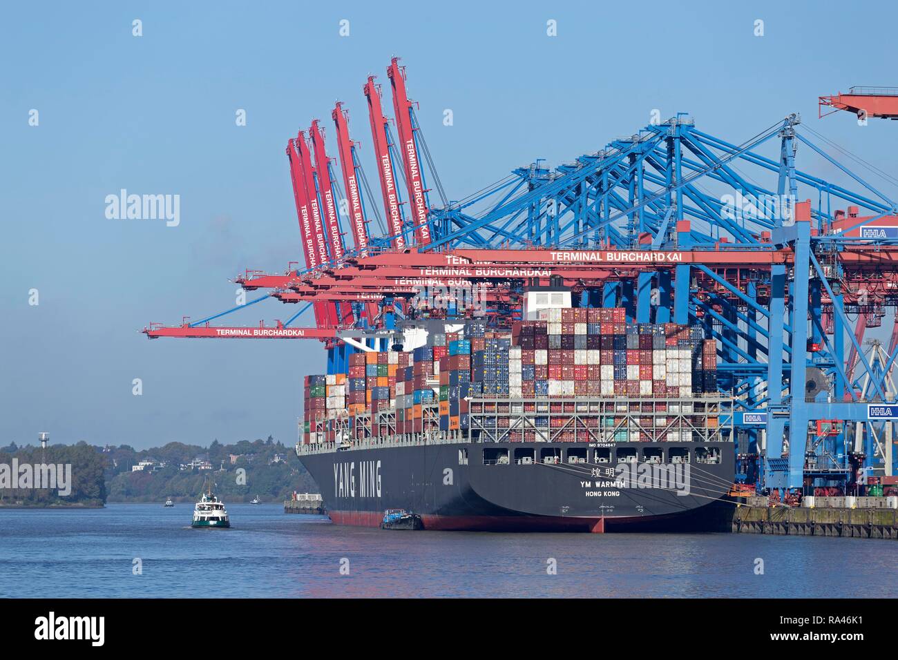 Loaded cargo ship in port, container terminal Burchardkai, Waltershof, Hamburg, Germany Stock Photo