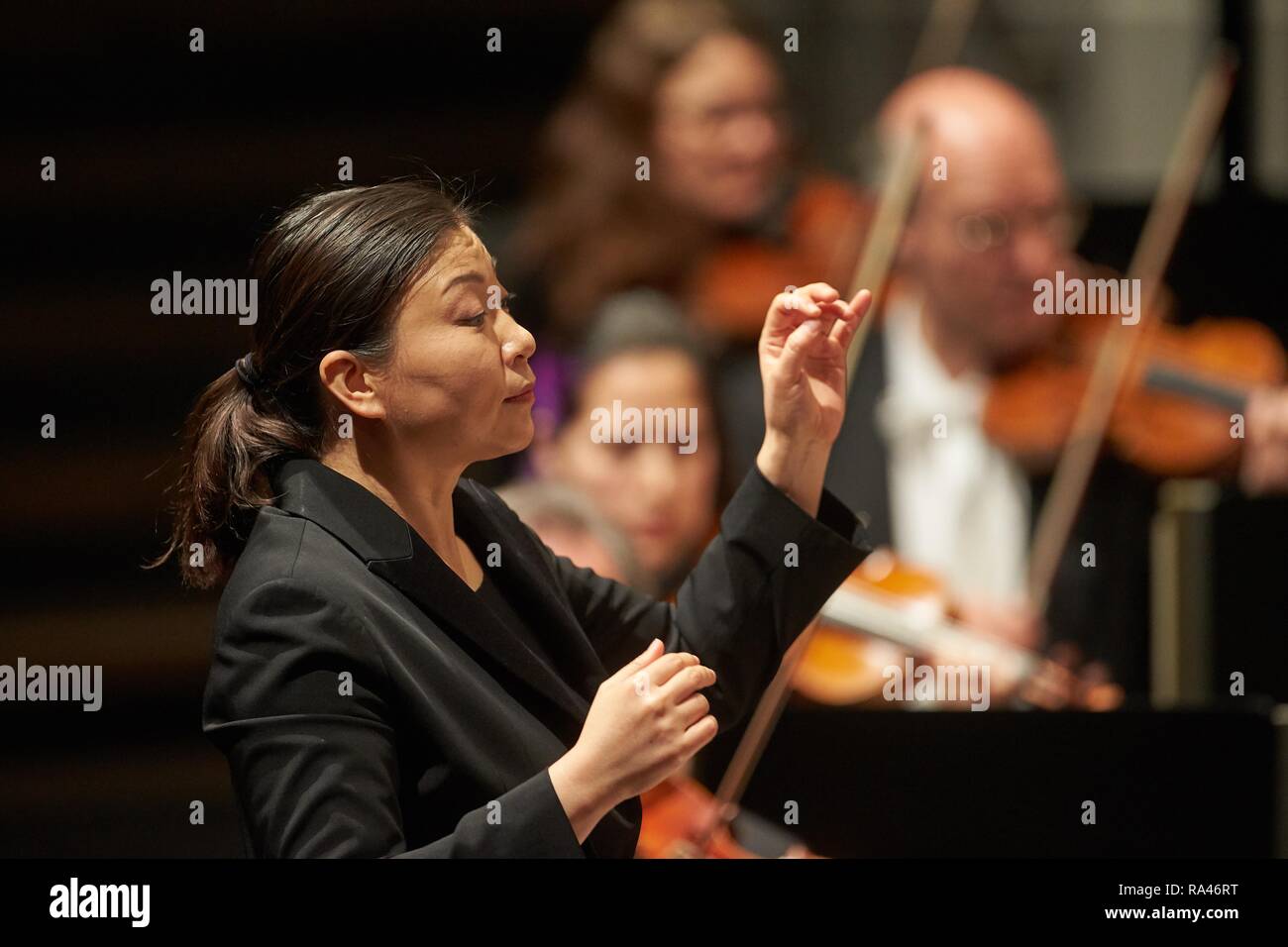 South Korean conductor Shiyeon Sung conducts the Staatsorchester Rheinische Philharmonie, concert of the Musik-Institut-Koblenz Stock Photo