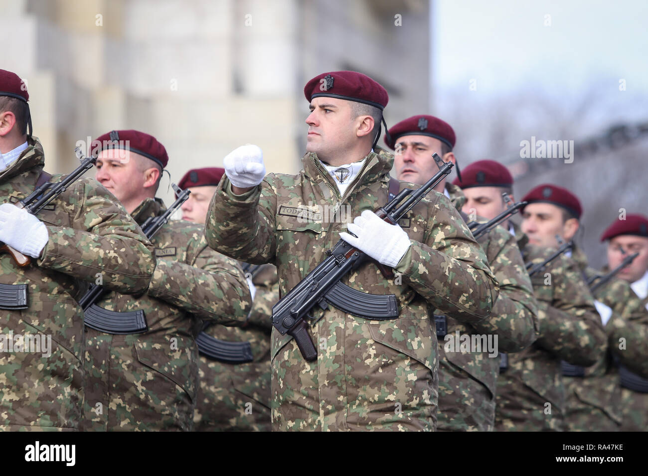 Bucharest, Romania - December 1, 2018: Romanian army soldiers, armed with AK-47 assault rifles, take part at the Romanian National Day military parade Stock Photo