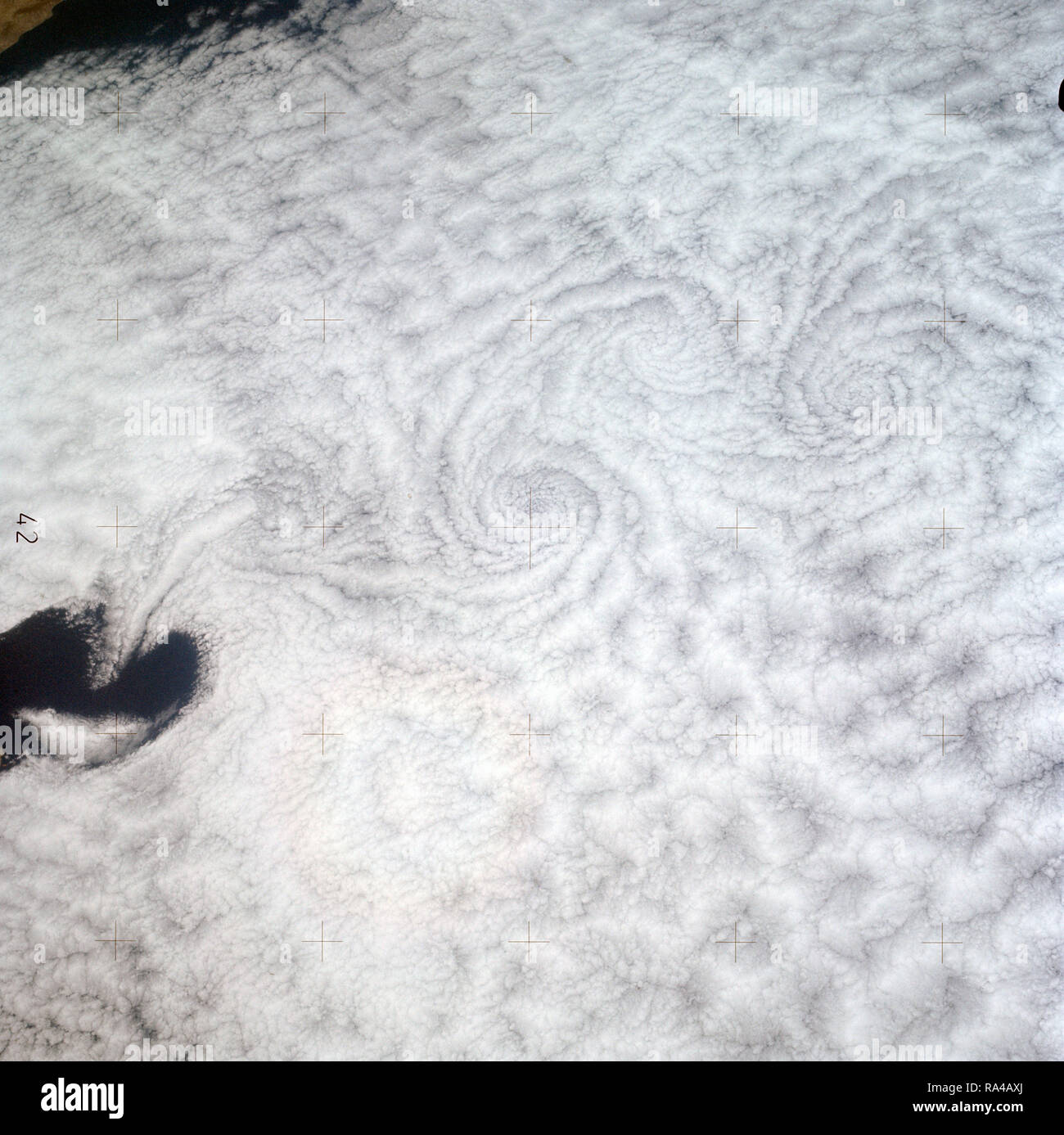(July-September 1973) --- A pattern of downstream eddies in the stratocumulus clouds over the Pacific Ocean west of Baja California, as photographed by the crewmen of the second Skylab manned mission (Skylab 3) from the space station cluster in Earth orbit. The clouds, produced by the cold California current running to the south and southwest, are prevented from rising by warm air above them. Stock Photo