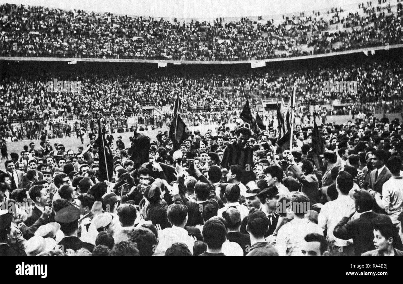 Milan, San Siro, June 2, 1959. At the end of the home victory versus A.C. Udinese (7-0), valid for the 33rd round of the Italian Championship 1958–59 Serie A, A.C. Milan's team and supporters celebrates the mathematics conquest of the Scudetto. Stock Photo