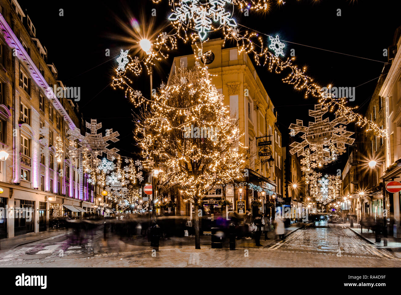 Seven Dials, Christmas lights in London, taken at dusk, early evening around Christmas 2018. 7 Dials Stock Photo