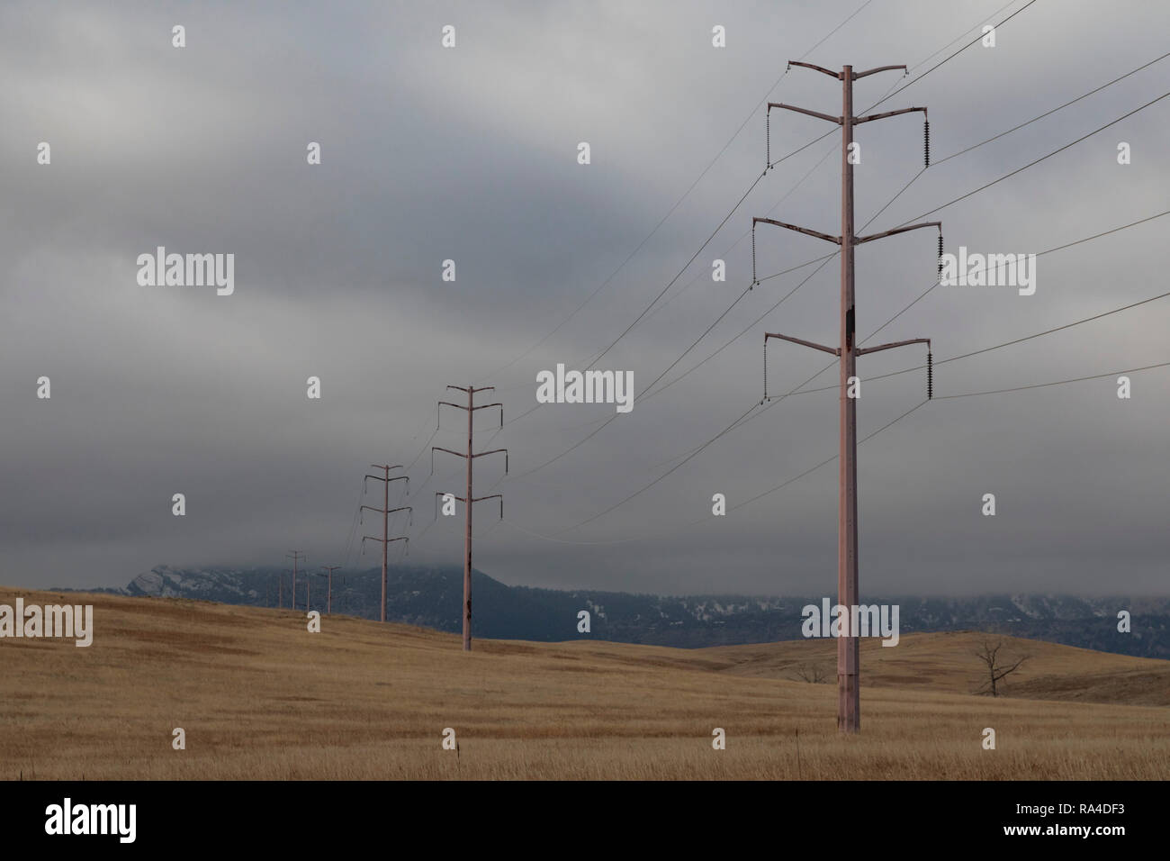 Denver, Colorado - A high-voltage power line crosses Rocky Flats National Wildlife Refuge,. Stock Photo