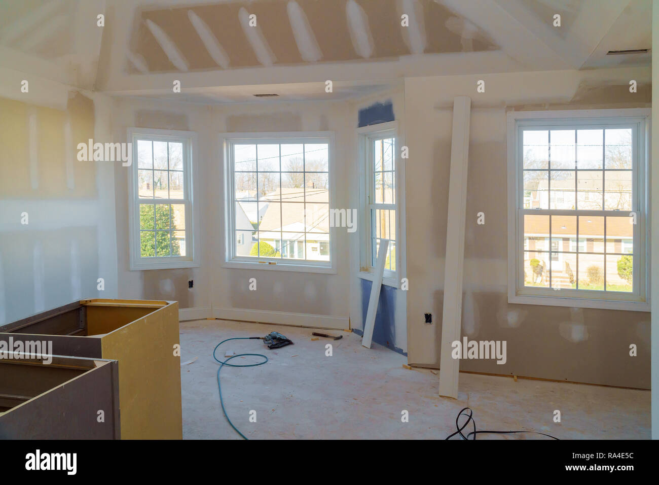 Painting applied interior construction of housing with drywall