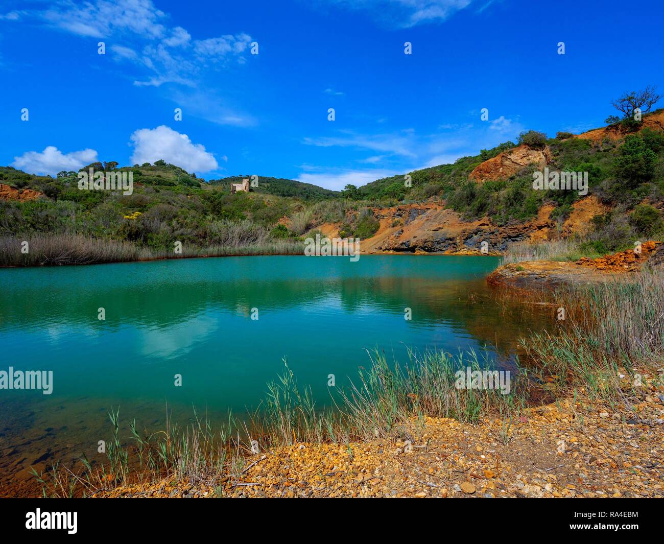 Laid-down mine with quarry pond Laghettto di Terranera, Elba, Tuscany, Livorno province, Italy Stock Photo