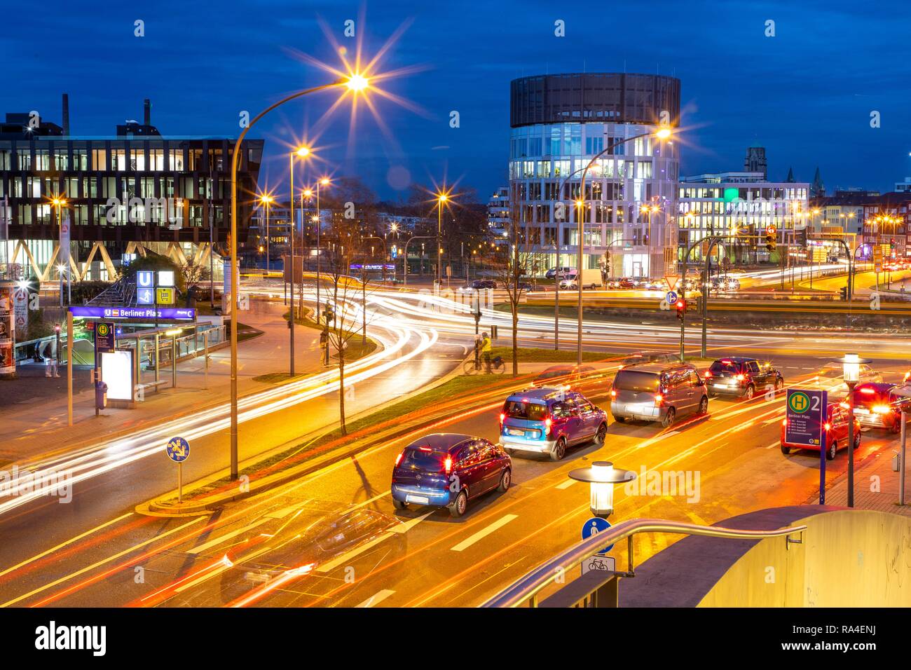 Evening city traffic in Essen, Germany, large intersection, roundabout, Berliner Platz, Berlin Square, this area would also be Stock Photo