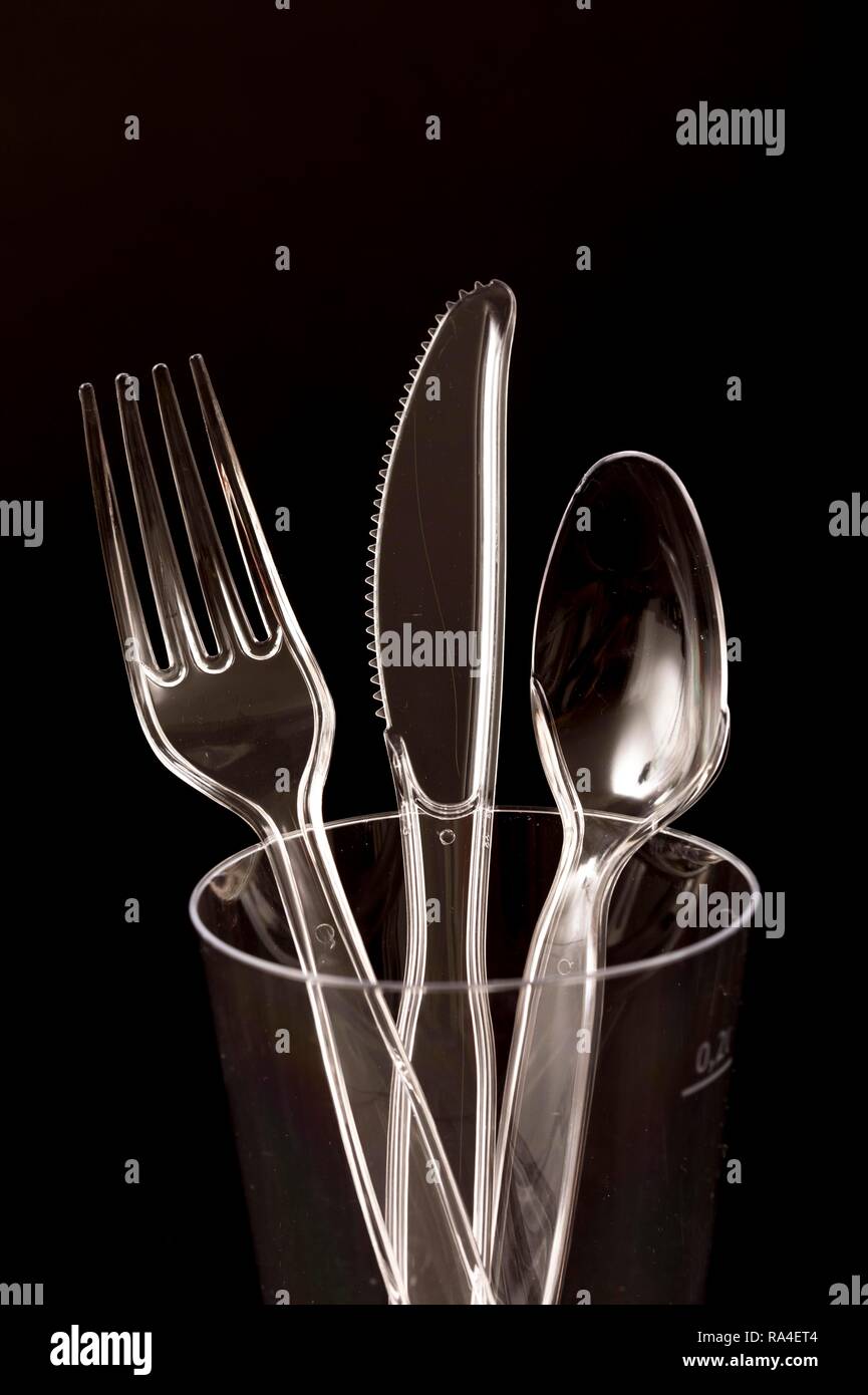 Plastic cutlery, disposable cutlery, knives, forks, spoons, plastic waste, transparent, transparent Stock Photo