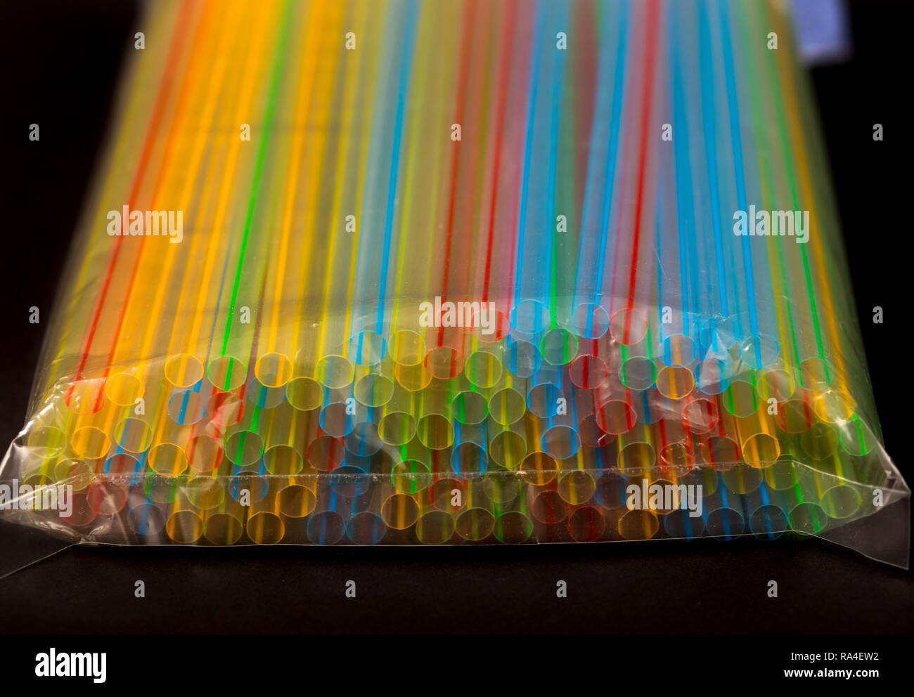 Plastic drinking straws, plastic waste, different colours and sizes Stock Photo