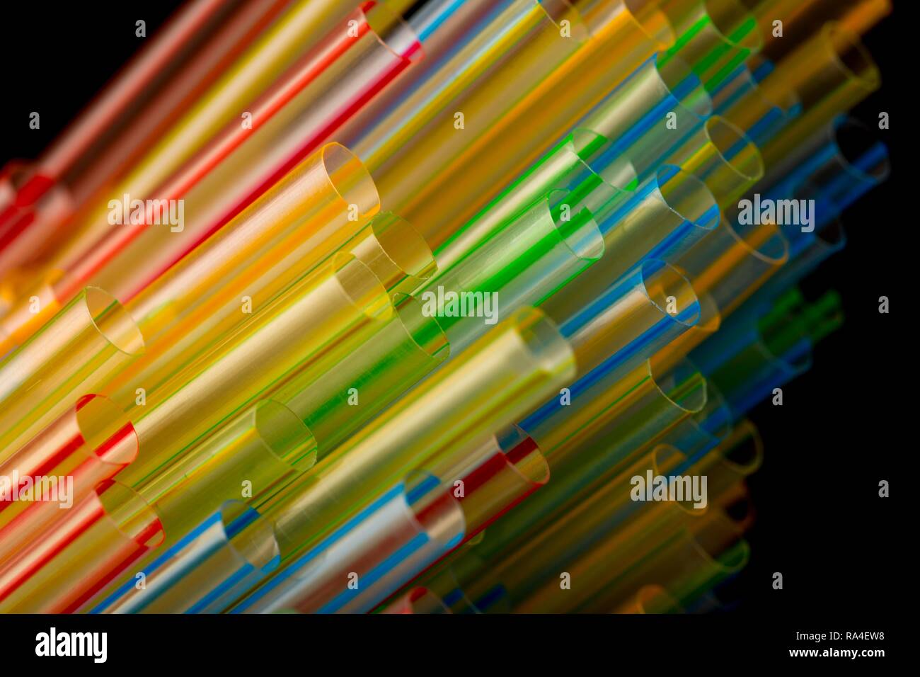 Plastic drinking straws, plastic waste, different colours and sizes Stock Photo