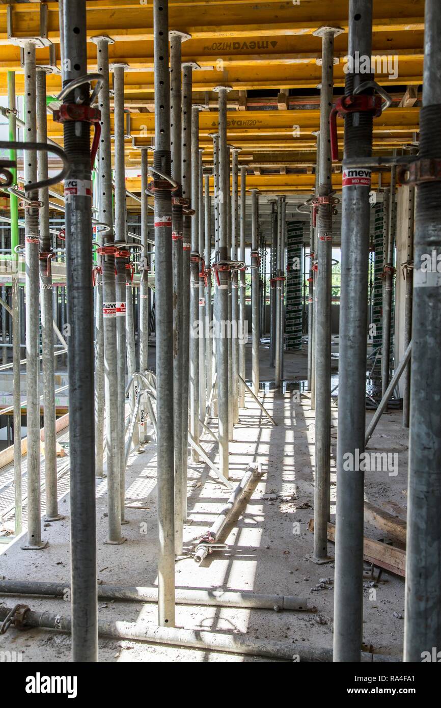 Construction site, shell, scaffolding, slab support after concreting