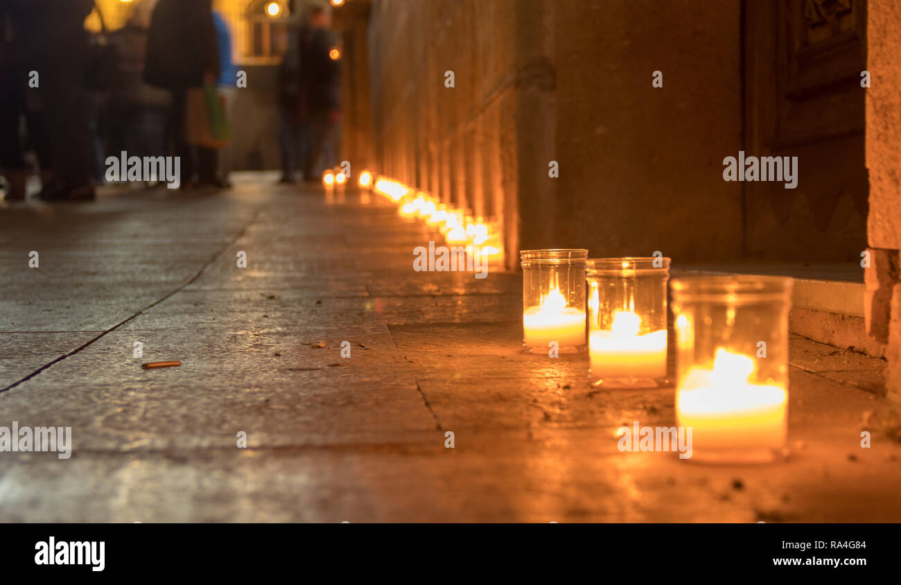 NIGHT PHOTOGRAPH OF THE NIGHT OF THE LIGHTS WITH THE STREET FULL OF CANDLES Stock Photo