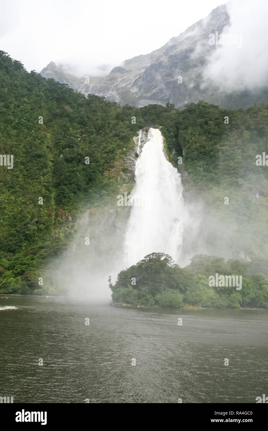 Waterfall on a mountain river. Landscapes of New Zealand Stock Photo ...