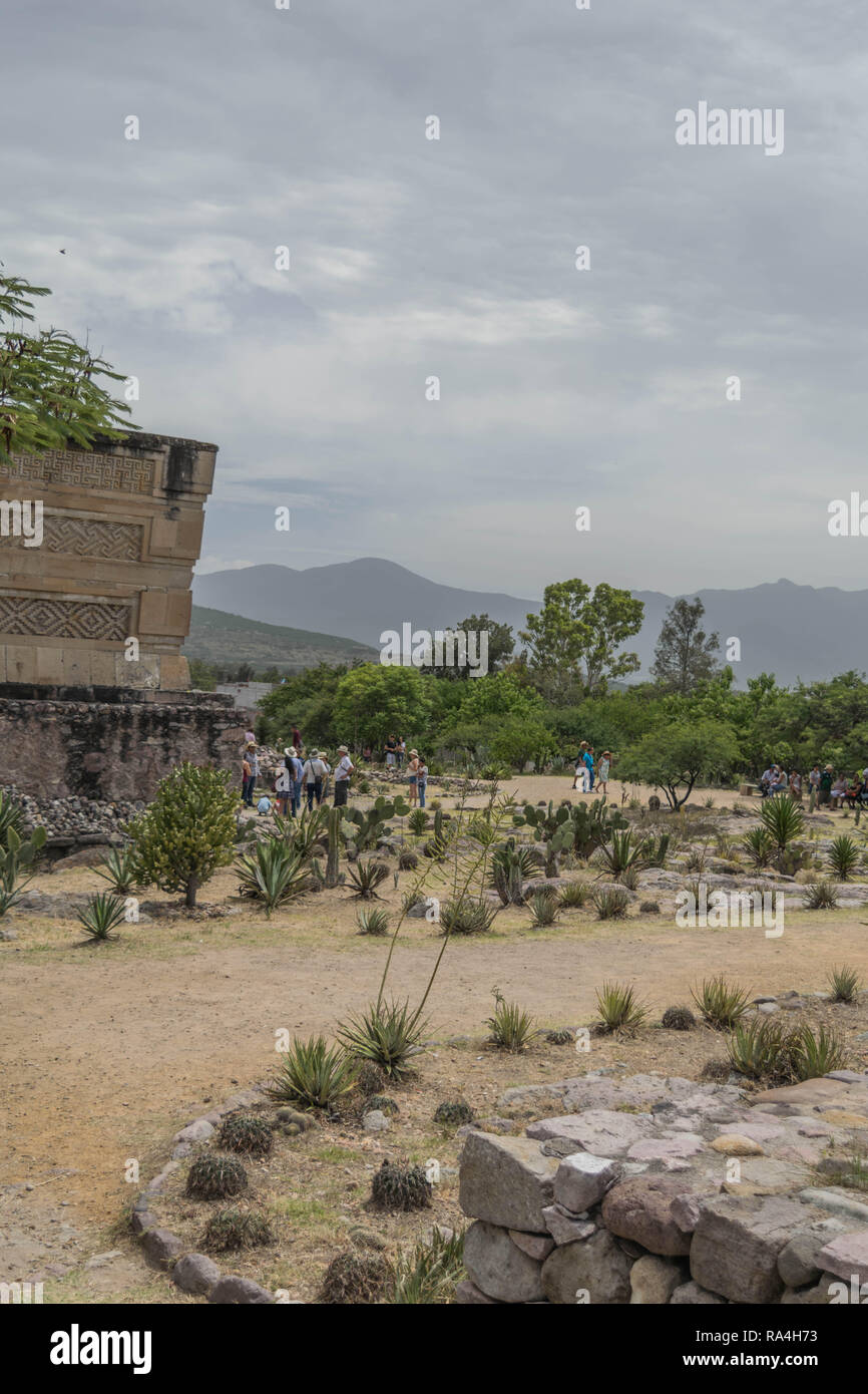 Ancient Zapotec ruins at Mitla, with a winding path, tourists and