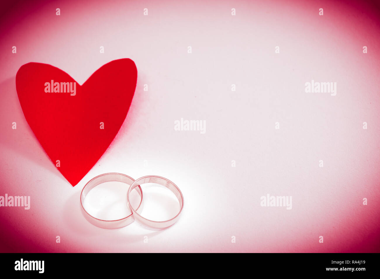 Red heart and engage ring on white background, Valentines Day background, wedding  day Stock Photo - Alamy