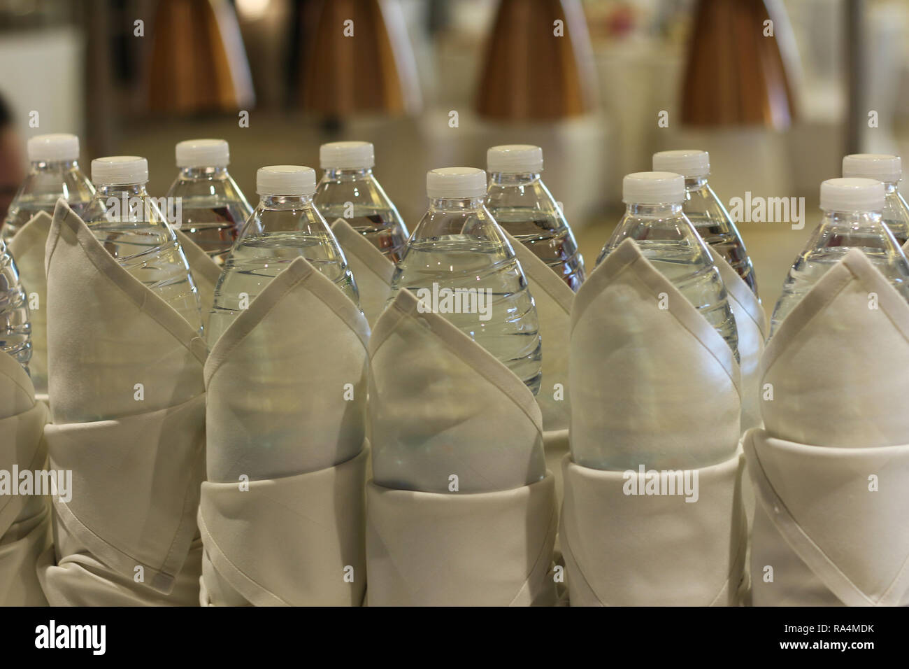 bottled drinking water warped in cloth Stock Photo