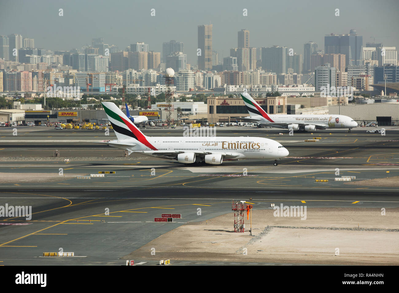 Emirates flight takeoff from Dubai Stock Photo