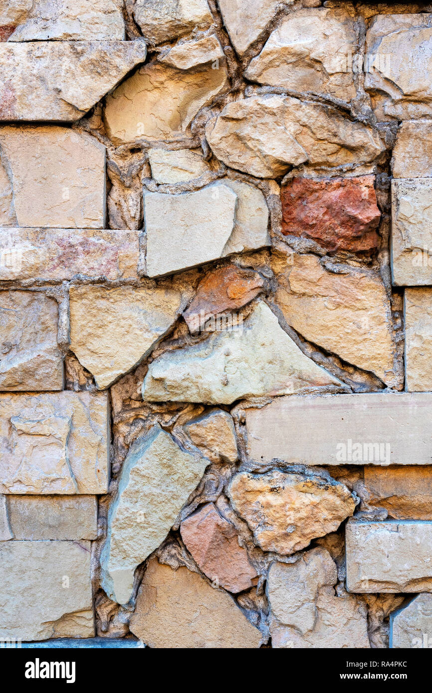Close Up Photo Fragment Of Masonry Wall With Decorative Stone