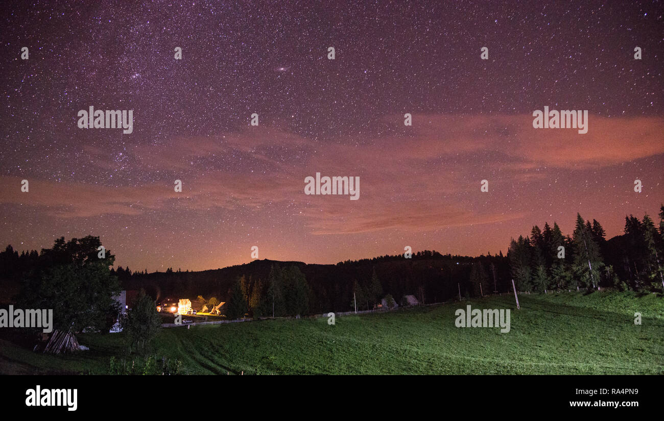 Starry sky over the Carpathian Mountains, Romania Stock Photo