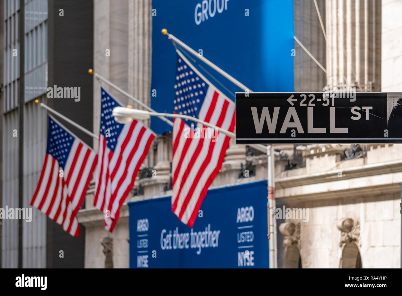 Wall Street sign near New York Stock Exchange Stock Photo